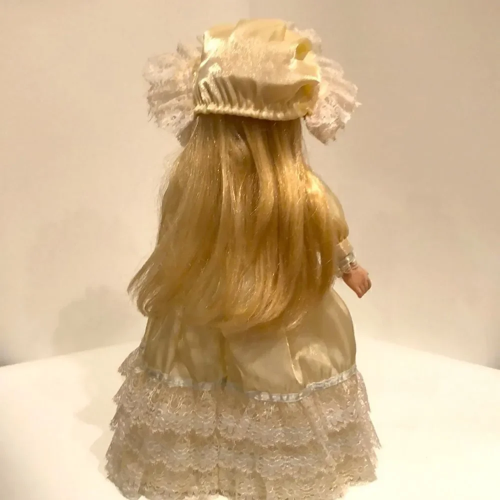 Porcelain doll 14”